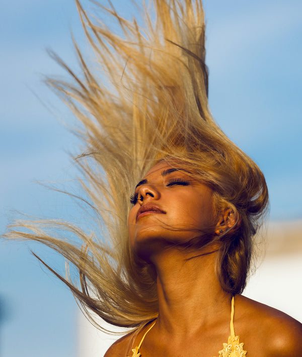 10 Ways to Keep Your Hair Safe From the Summer Sun